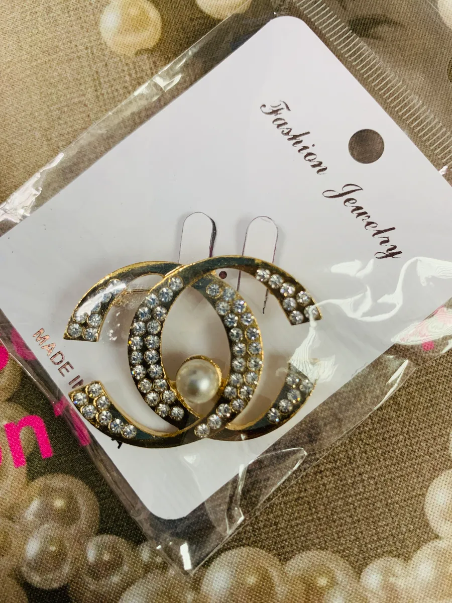 CC Brooches